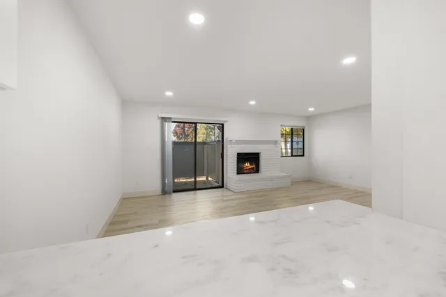 a kitchen with a stove microwave and refrigerator