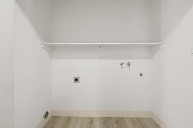 a bathroom with a bathtub and a toilet