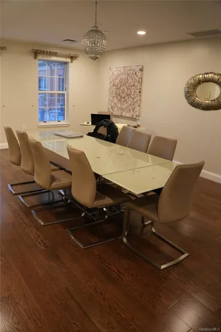 a kitchen with stainless steel appliances a refrigerator sink and microwave