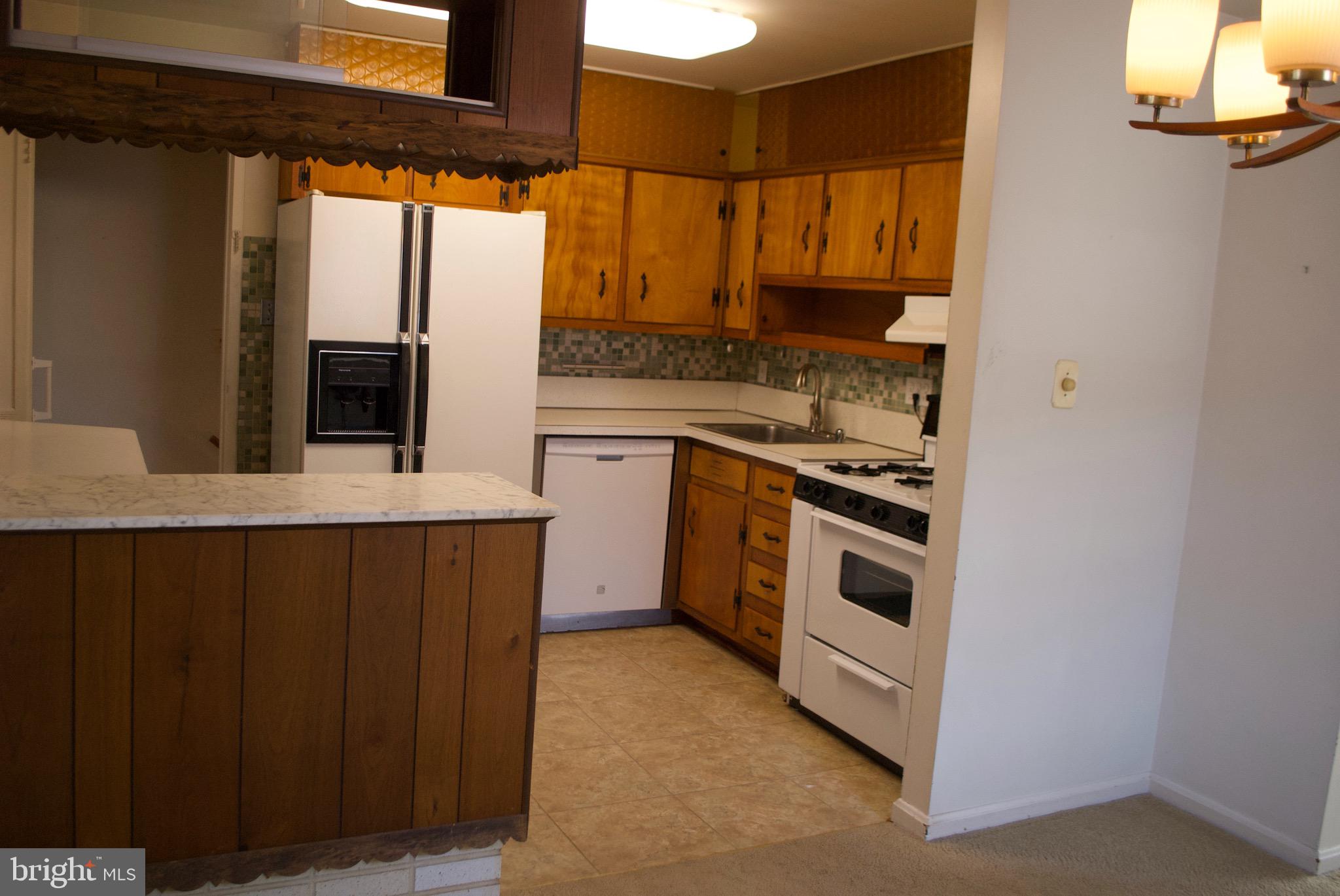 10809 Breewood Road Silver Spring, MD 20901 - Photo 4 of 24 Kitchen view from dining room