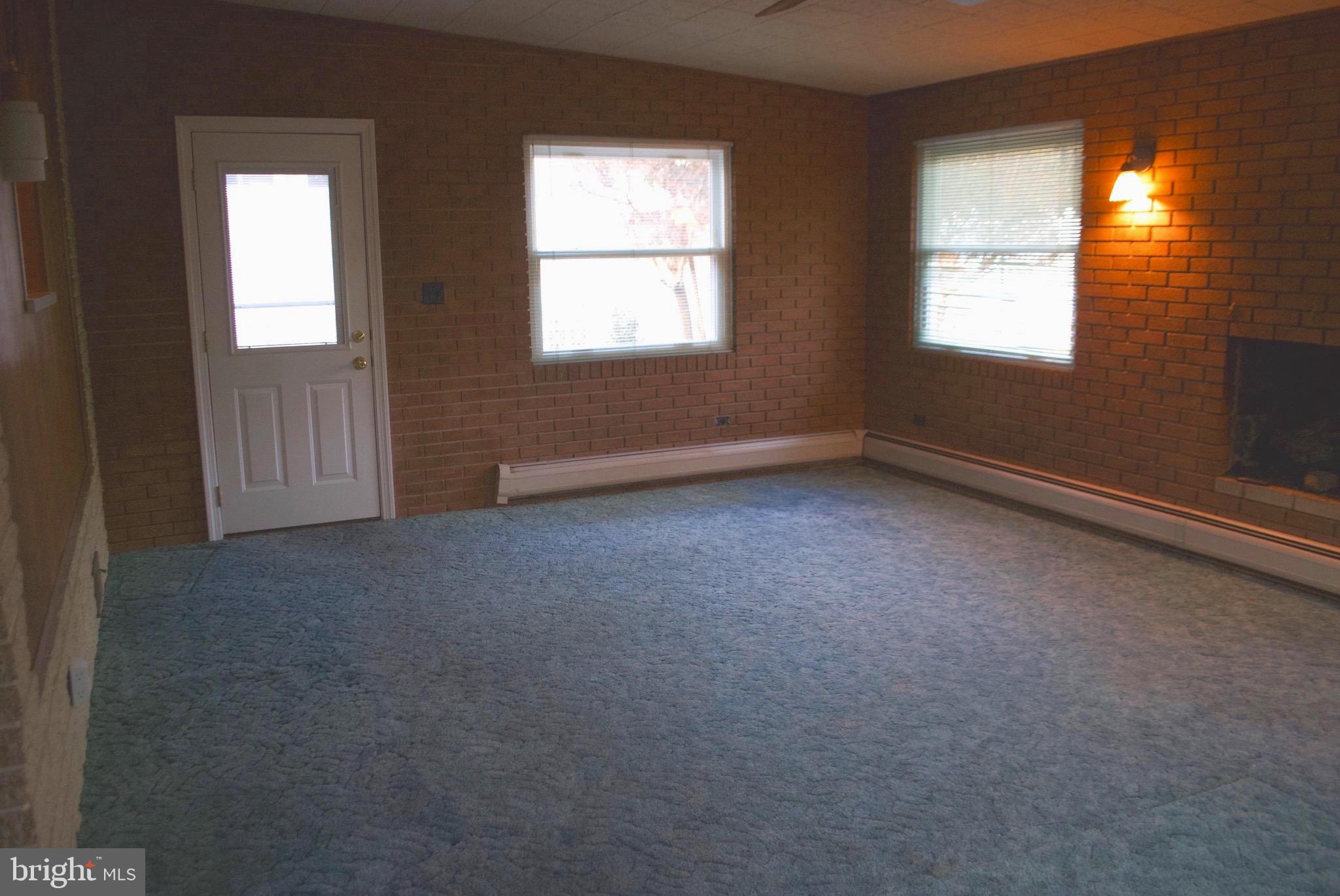 10809 Breewood Road Silver Spring, MD 20901 - Photo 6 of 24 Den and exit to yard