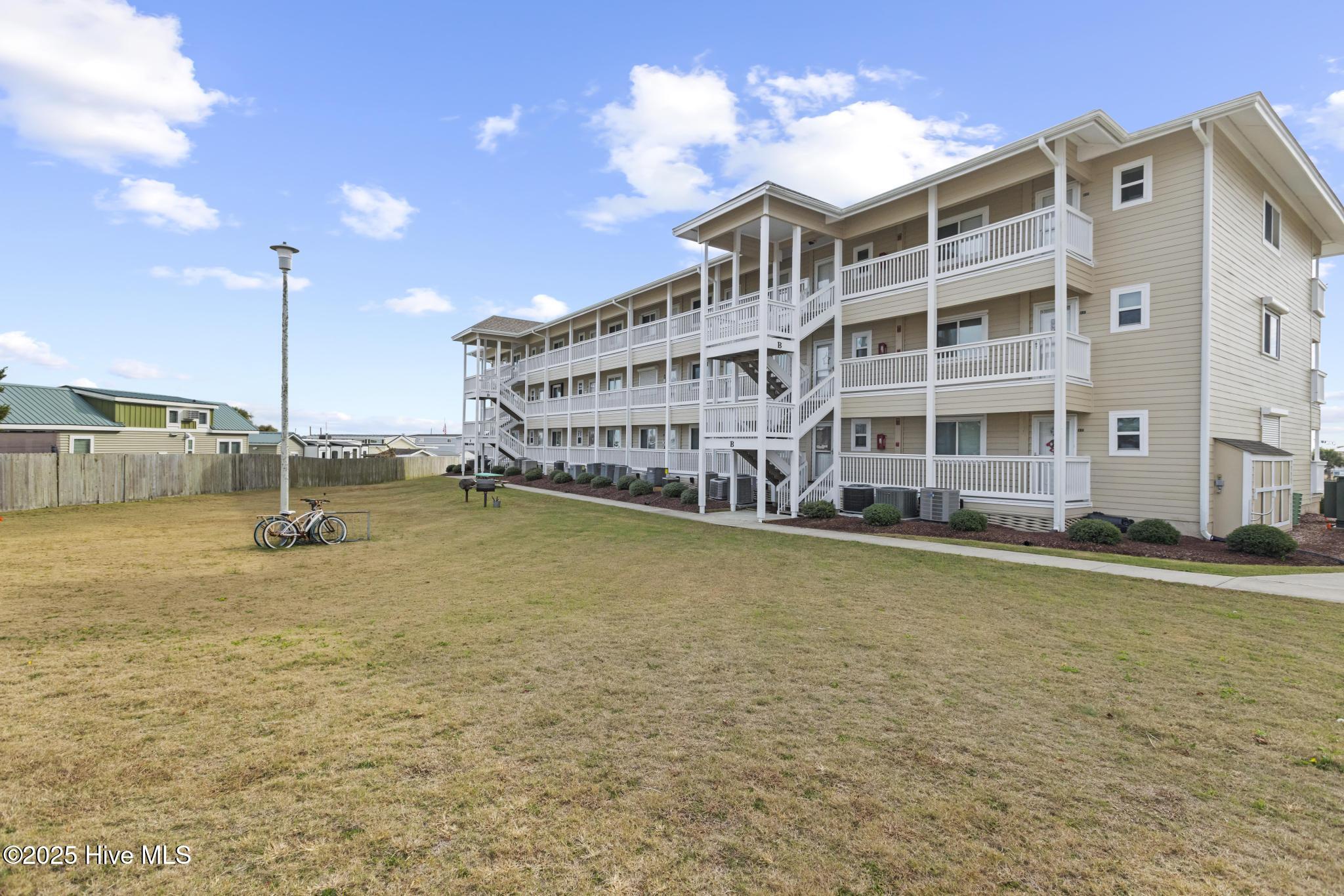 650 Cedar Point Boulevard, Unit B35 Cedar Point, NC 28584 - Photo 25 of 27 Outside - Back