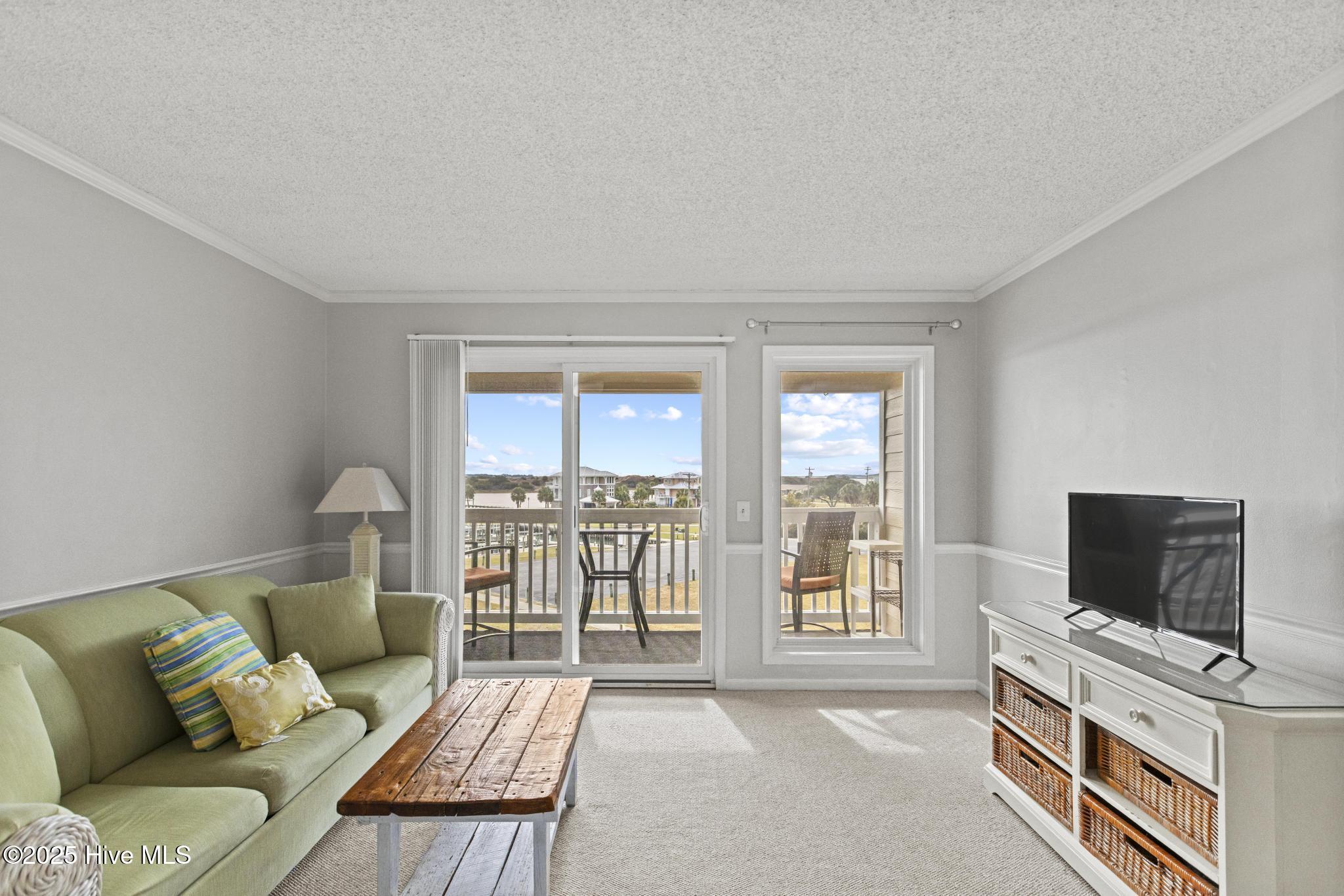 650 Cedar Point Boulevard, Unit B35 Cedar Point, NC 28584 - Photo 3 of 27 Living Room
