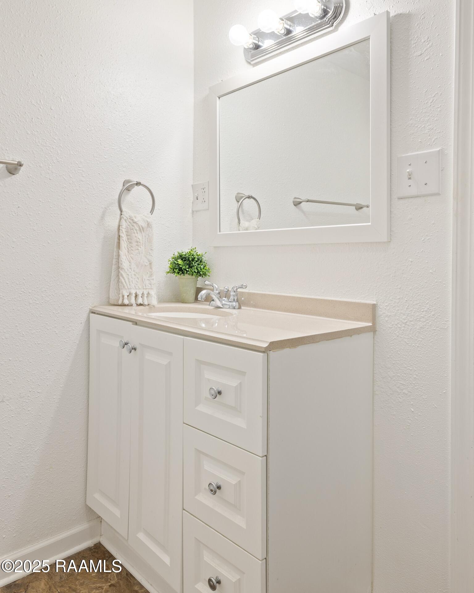 1002 Alexander Road St. Martinville, LA 70582 - Photo 15 of 17 main bathroom vanity