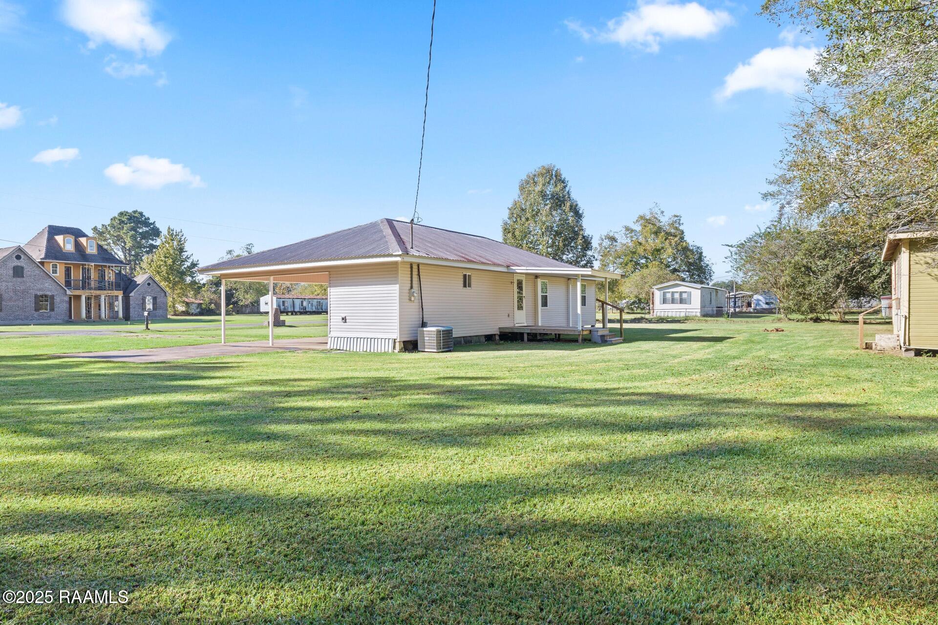 1002 Alexander Road St. Martinville, LA 70582 - Photo 17 of 17 backyard looking toward back of home