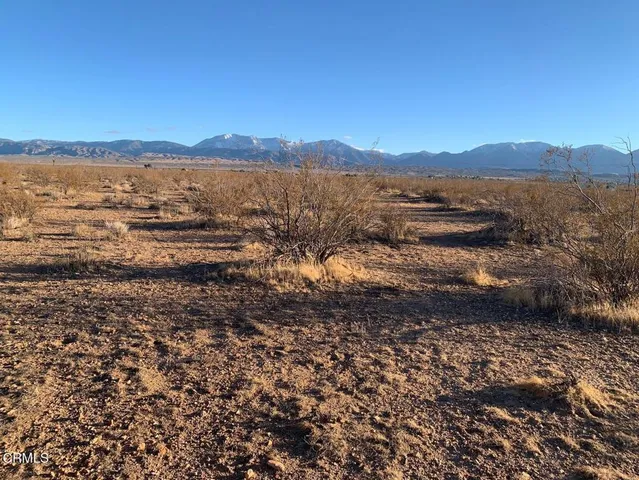 a view of mountain with lake view