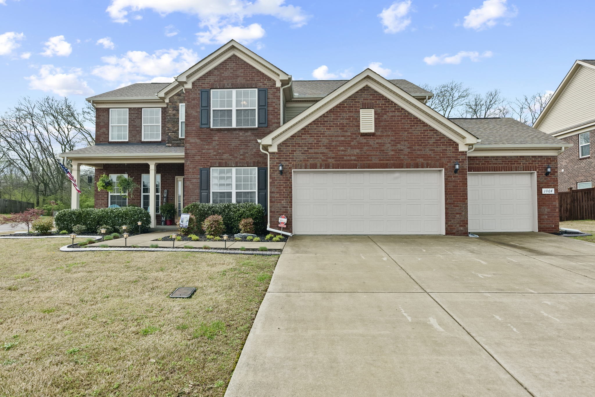 1064 Addington Road Hendersonville, TN 37075 - Photo 3 of 55 a front view of a house with yard