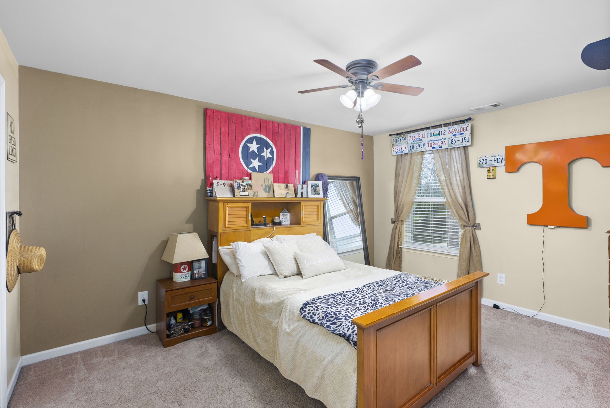 1064 Addington Road Hendersonville, TN 37075 - Photo 45 of 55 a bedroom with a bed and a chandelier