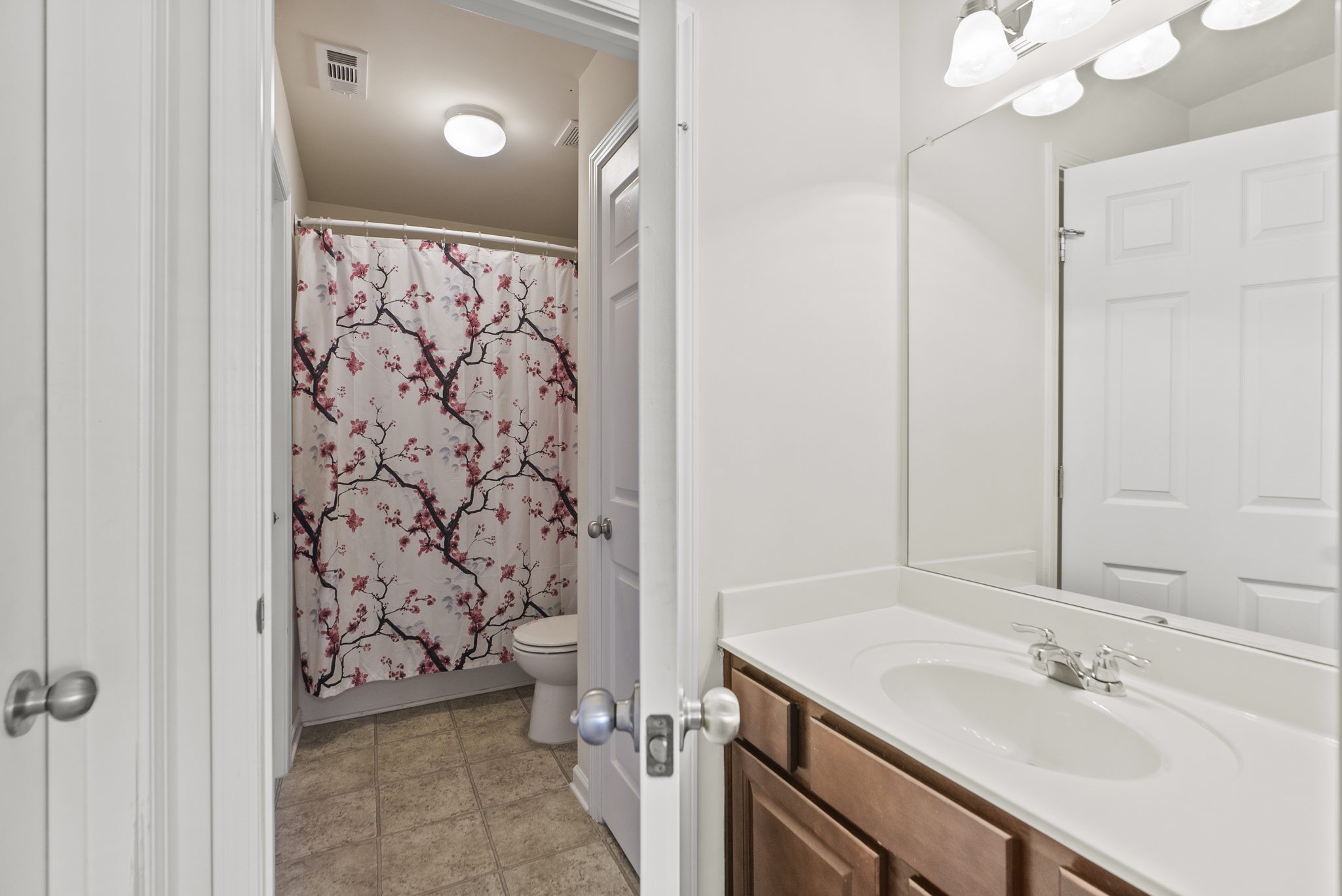 1064 Addington Road Hendersonville, TN 37075 - Photo 49 of 55 a bathroom with a sink vanity granite and a toilet