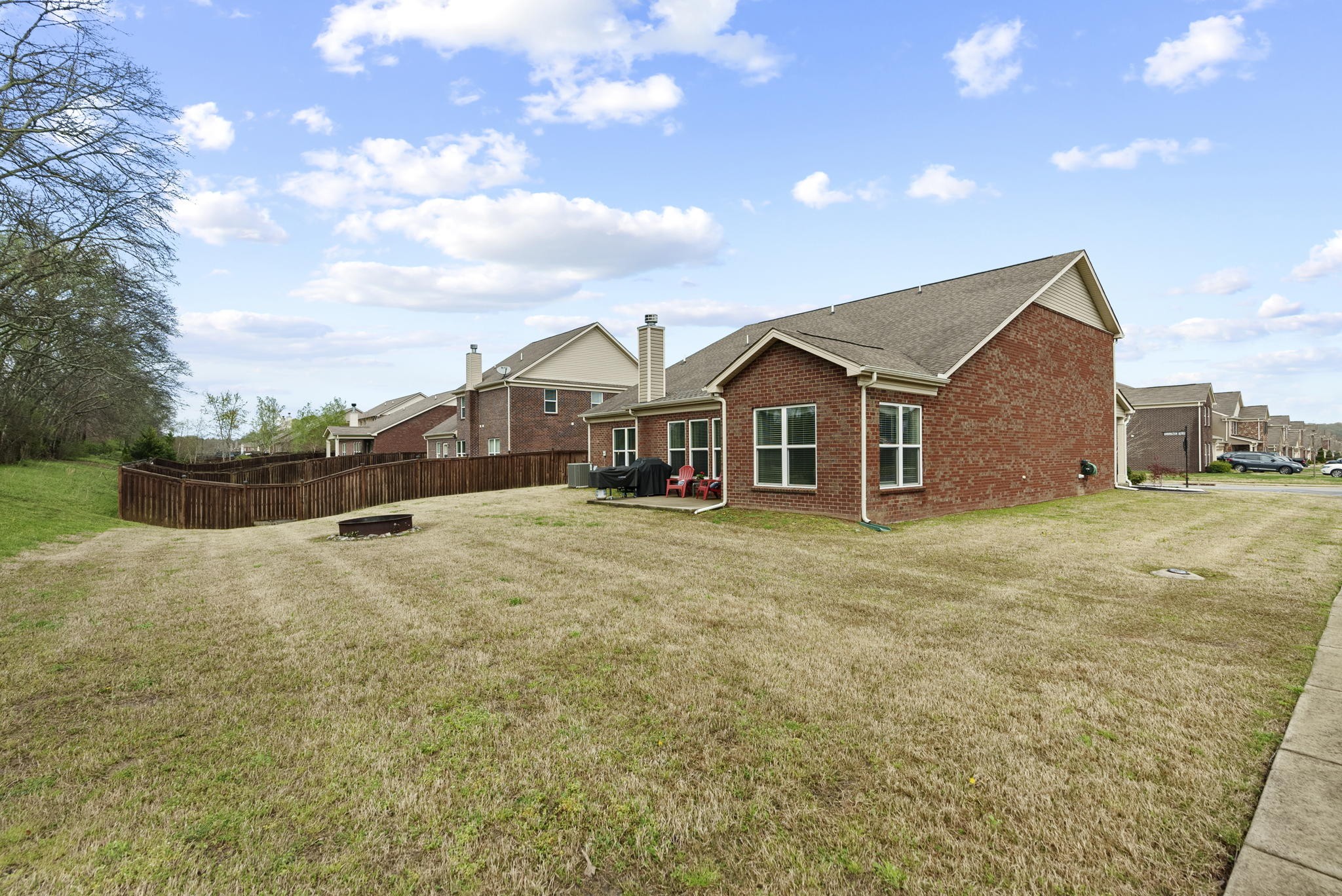1064 Addington Road Hendersonville, TN 37075 - Photo 50 of 55 a view of a house with a yard