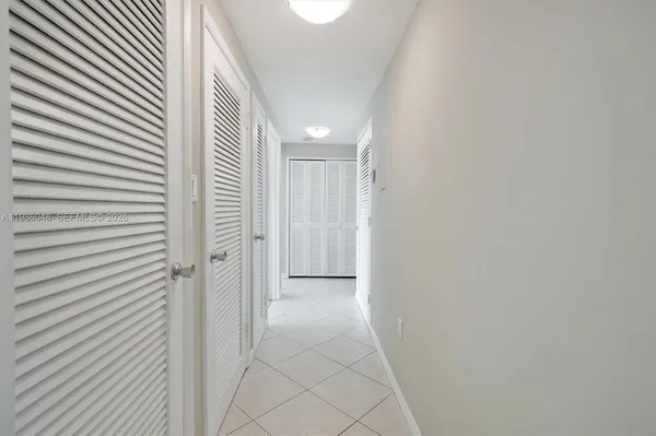 a view of a room with a hallway