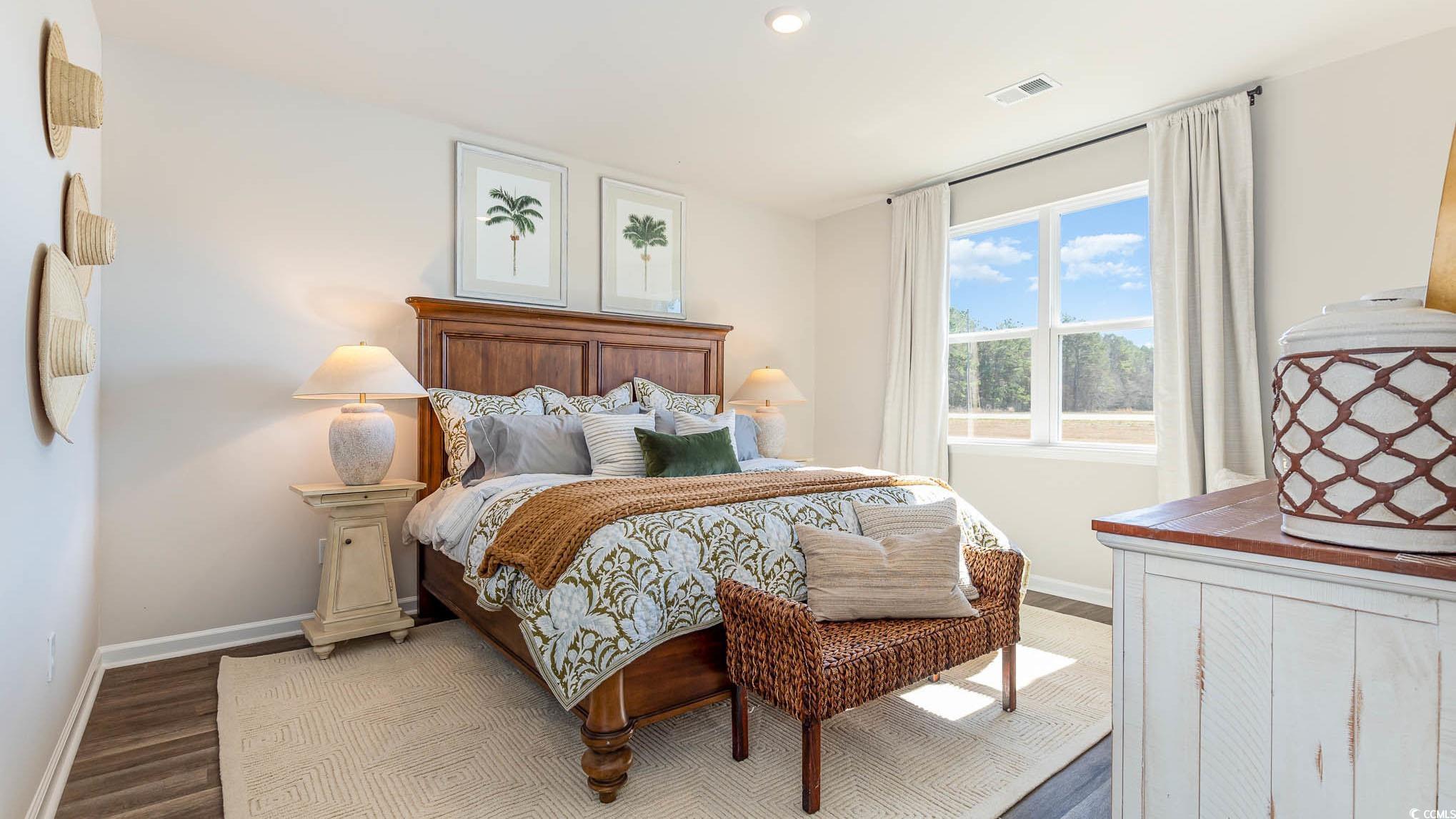 241 Ridley Street Longs, SC 29568 - Photo 12 of 40 Bedroom featuring wood finished floors and recessed lighting
