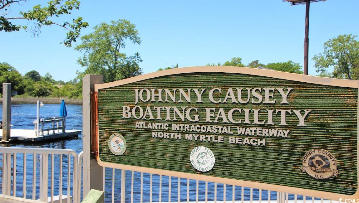 241 Ridley Street Longs, SC 29568 - Photo 38 of 40 Community sign featuring a water view