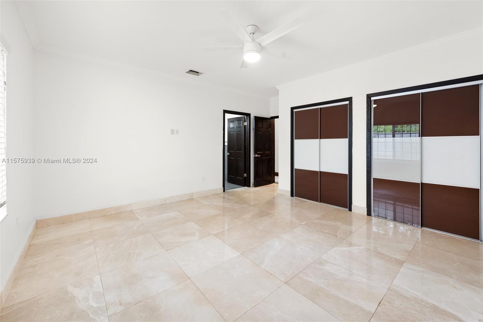 2811 Southwest 22nd Avenue Miami, FL 33133 - Photo 27 of 39 a view of empty room with cabinet