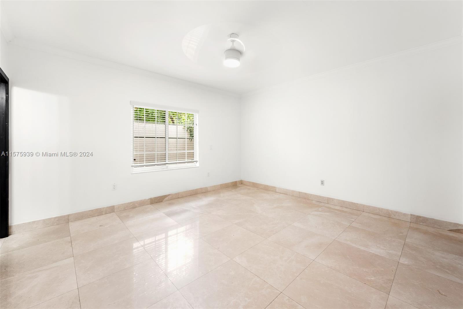 2811 Southwest 22nd Avenue Miami, FL 33133 - Photo 30 of 39 an empty room with windows