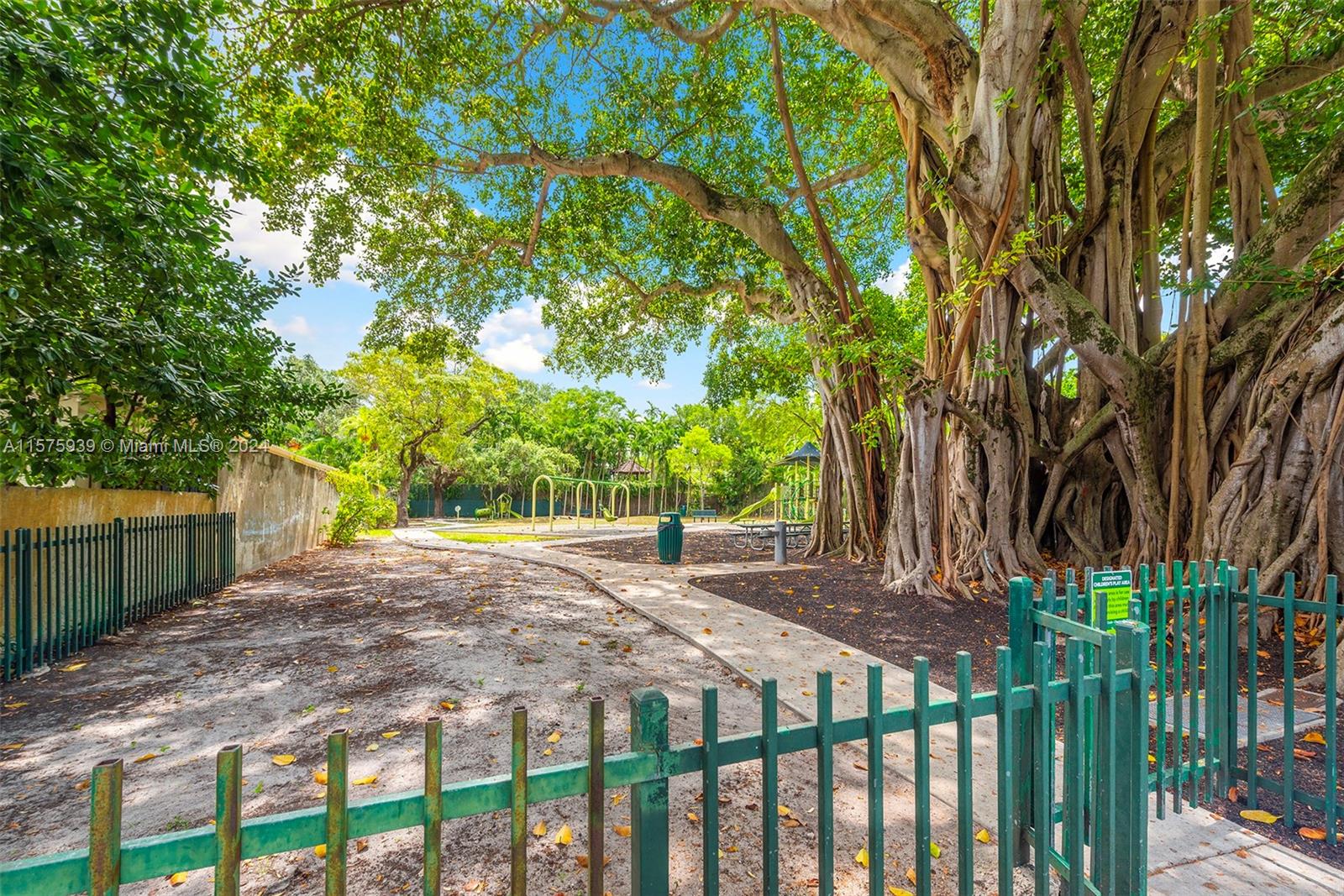 2811 Southwest 22nd Avenue Miami, FL 33133 - Photo 37 of 39 a view of a backyard with trees