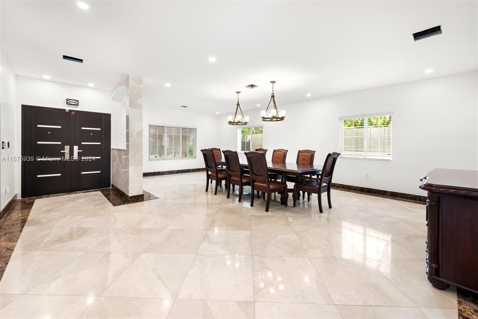 2811 Southwest 22nd Avenue Miami, FL 33133 - Photo 6 of 39 a view of a dining room with furniture