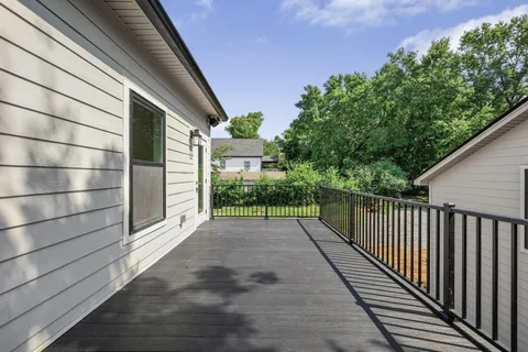a view of a pathway of a house with backyard