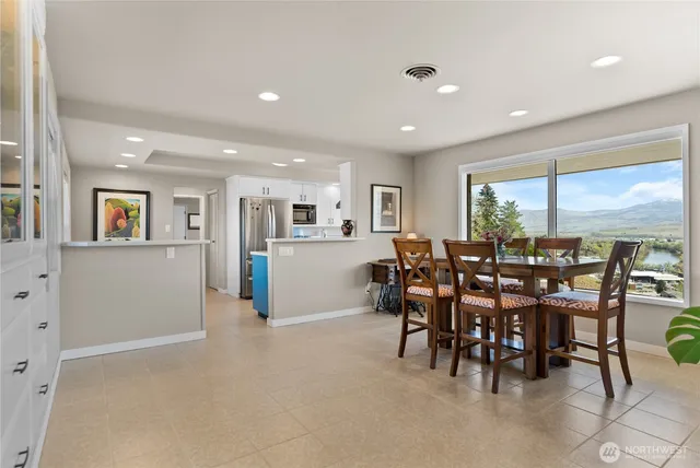 a view of a kitchen and dining room