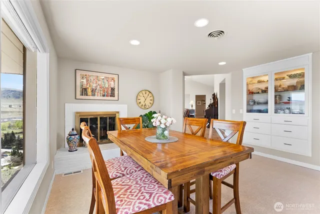 a kitchen with a refrigerator and a sink