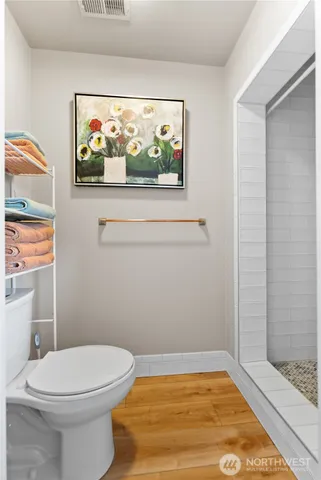 a bedroom with a bed and a table