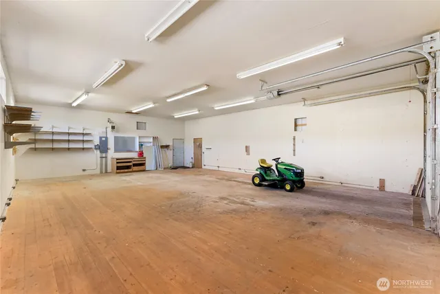 a view of walk in closet and bathroom