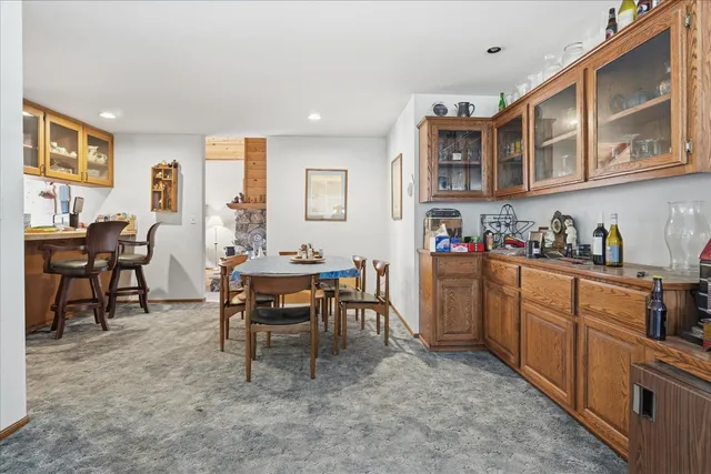 a view of a livingroom with furniture and a window