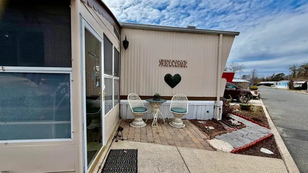 a view of an outdoor space with seating area
