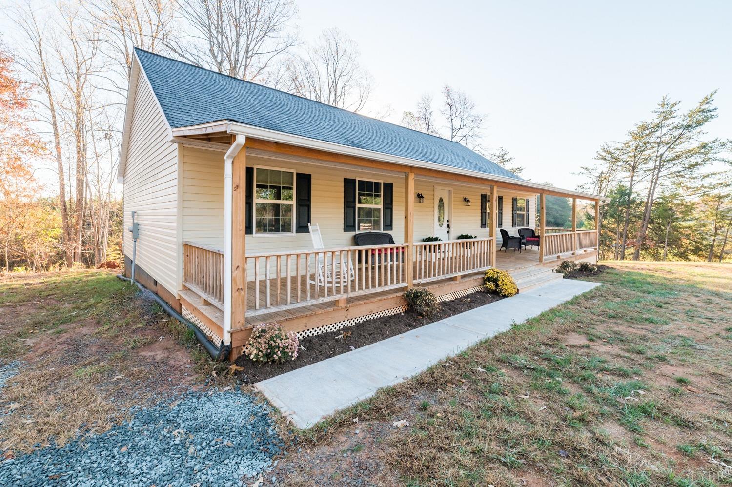 538 Spring Grove Road Spout Spring, VA 24593 - Photo 28 of 44 a view of a house with yard and sitting area