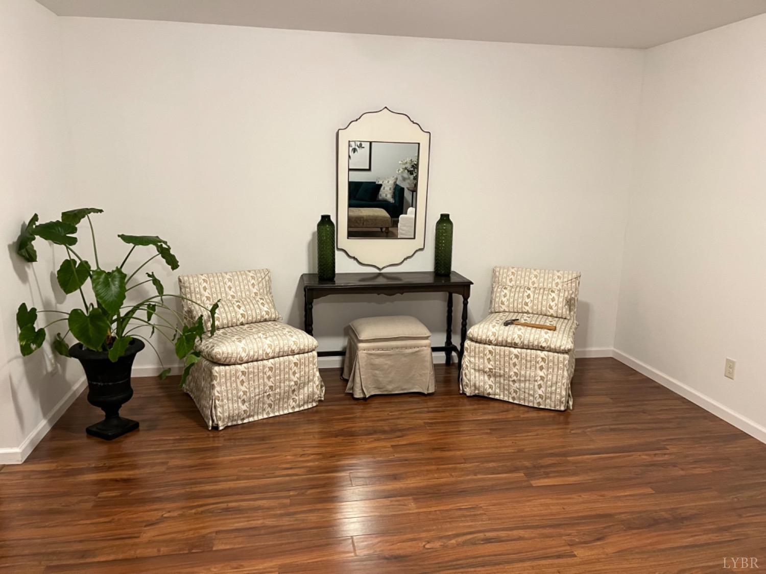 538 Spring Grove Road Spout Spring, VA 24593 - Photo 44 of 44 a living room with furniture and a potted plant