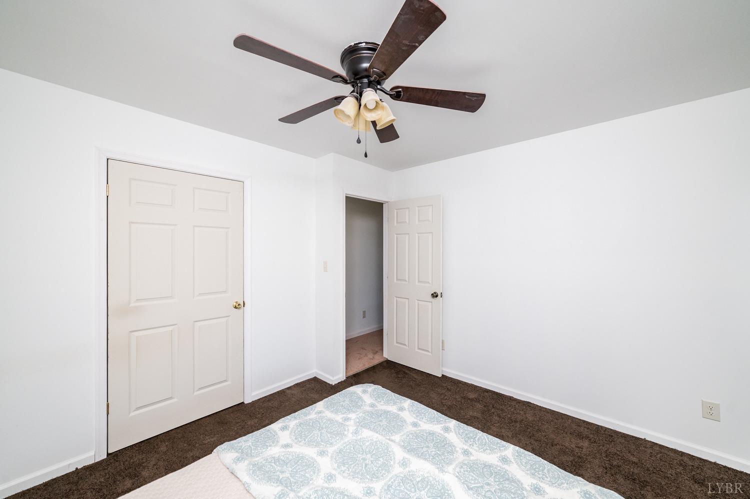 538 Spring Grove Road Spout Spring, VA 24593 - Photo 6 of 44 a view of empty room with ceiling fan
