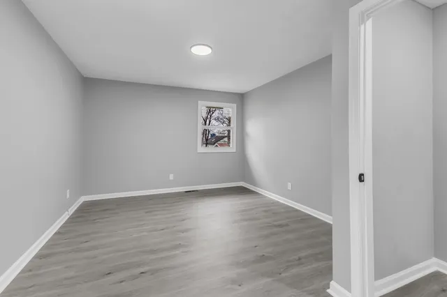 a view of a house with a snow in the yard