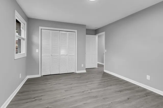 a view of backyard with tree