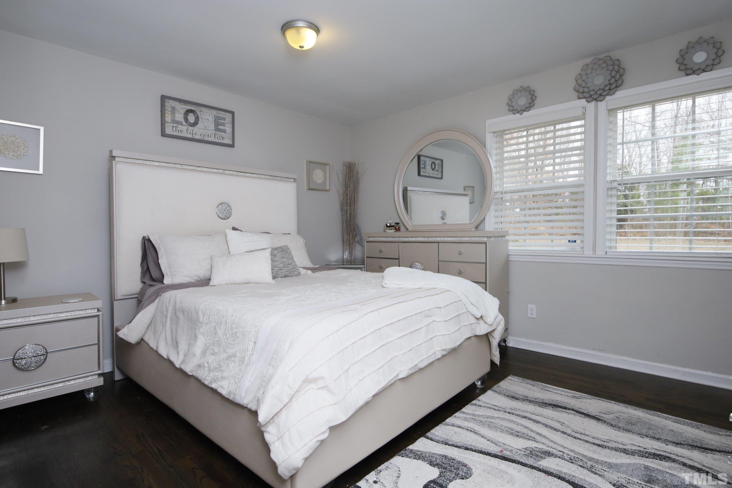 6120 Guess Road Durham, NC 27712 - Photo 11 of 22 a bedroom with a bed and a window