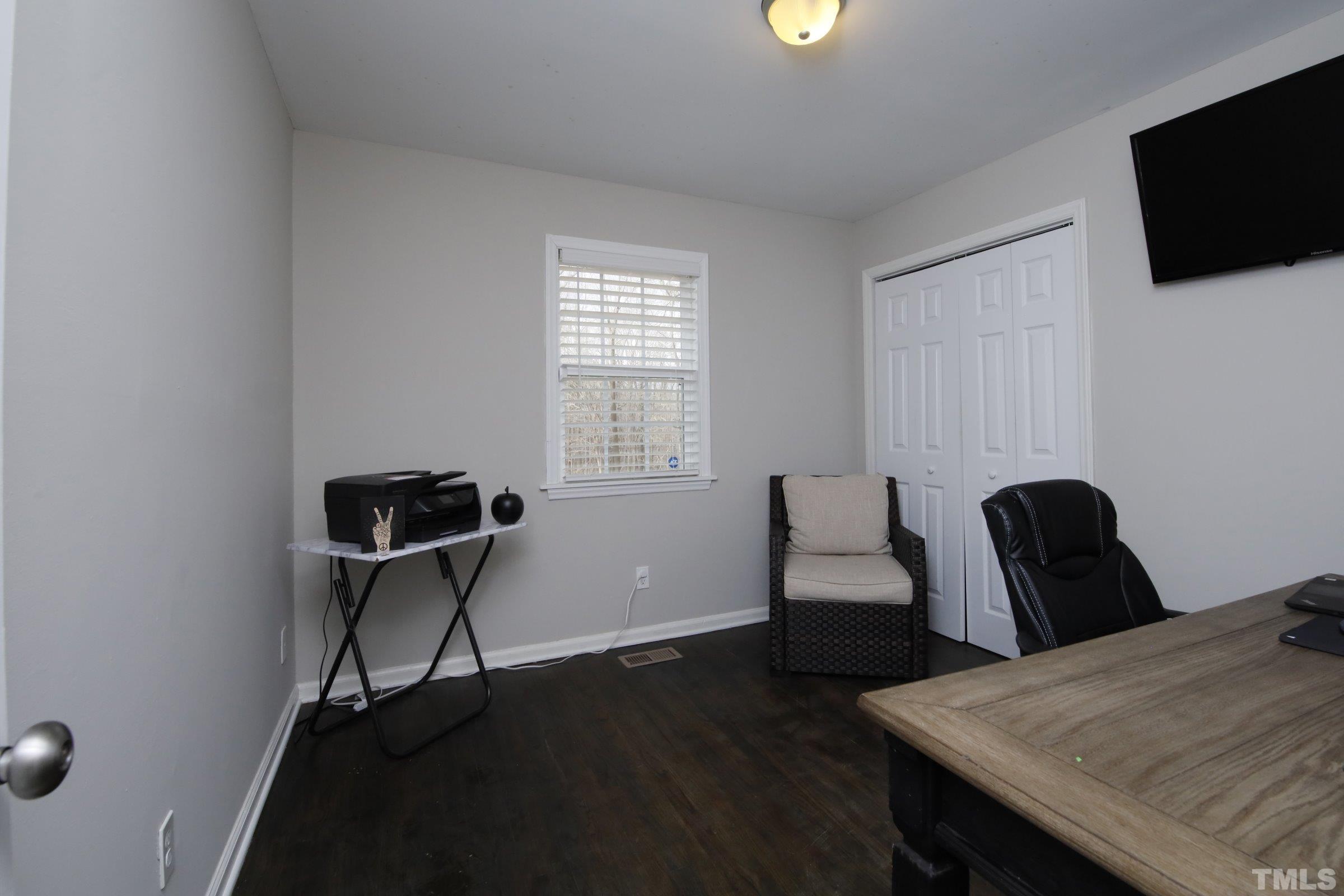 6120 Guess Road Durham, NC 27712 - Photo 14 of 22 a view of a workspace with furniture and a window
