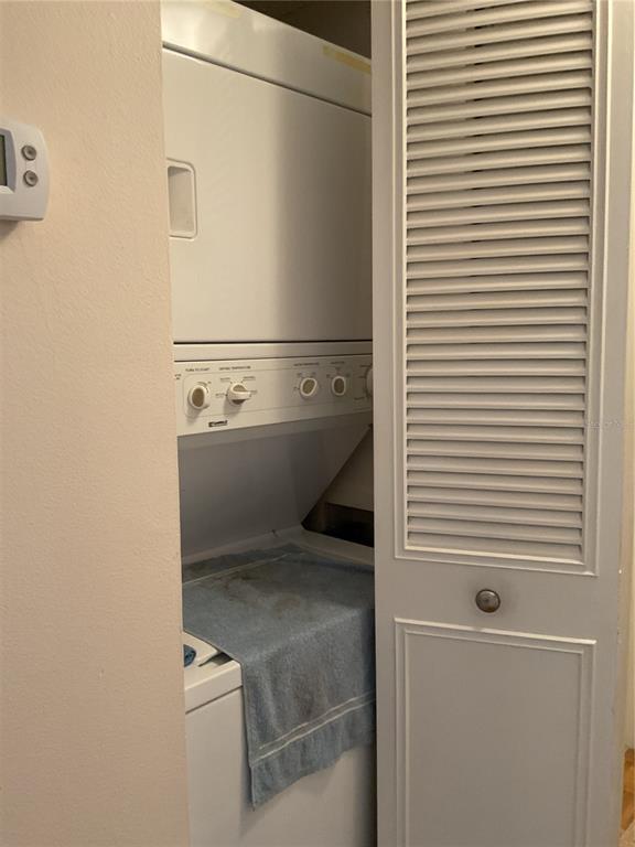 2655 Pine Ridge Way North, Unit D3 Palm Harbor, FL 34684 - Photo 16 of 31 a bathroom with a sink and mirror