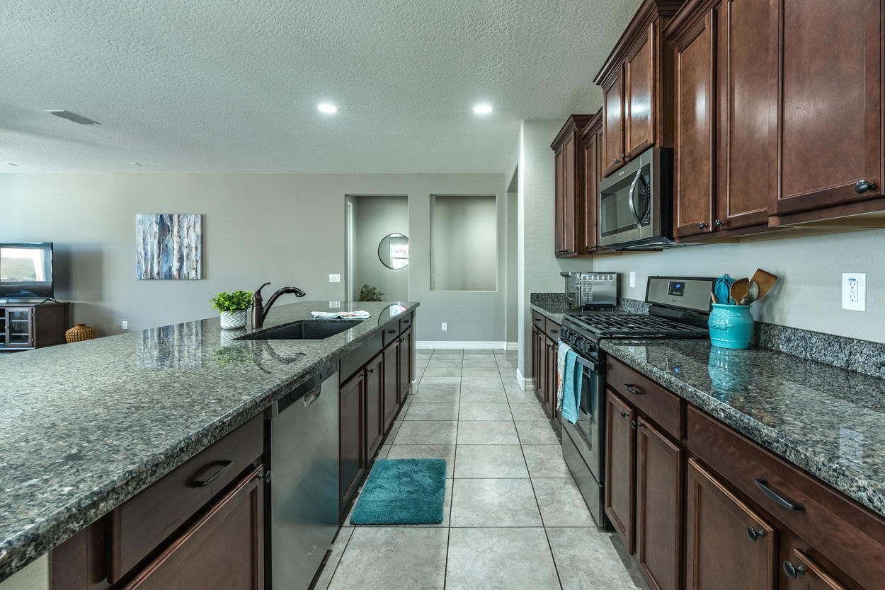 2565 North Springfield Street Buckeye, AZ 85396 - Photo 12 of 36 Kitchen with view of pocket office