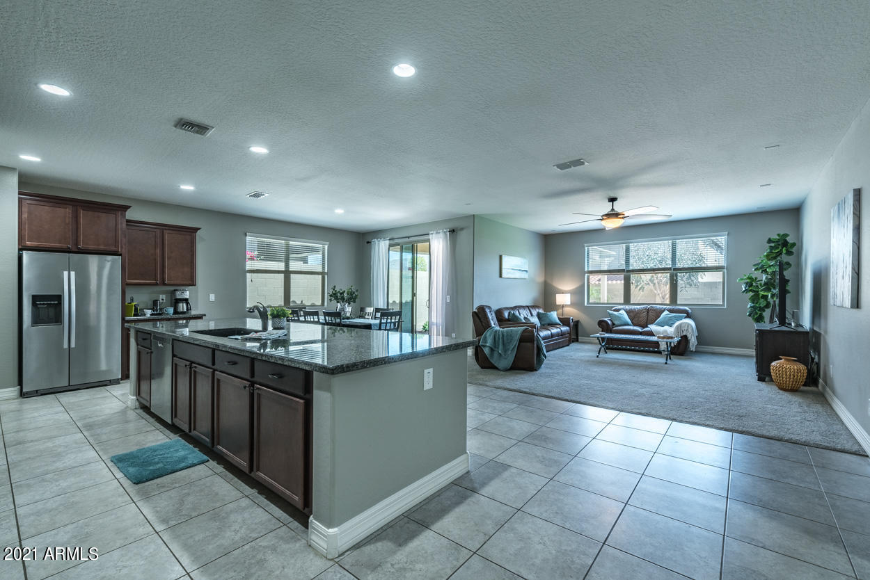 2565 North Springfield Street Buckeye, AZ 85396 - Photo 5 of 36 Ktichen/living room