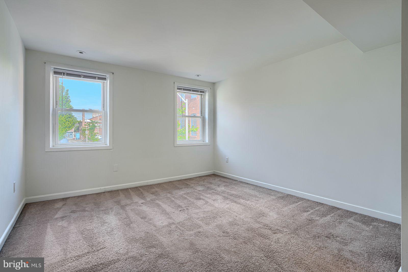 1026 Patapsco Street Baltimore, MD 21230 - Photo 11 of 24 an empty room with windows