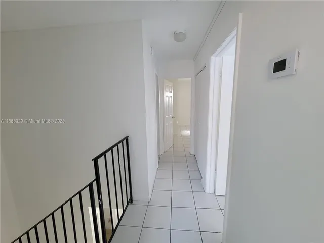 a car parked in front of a house