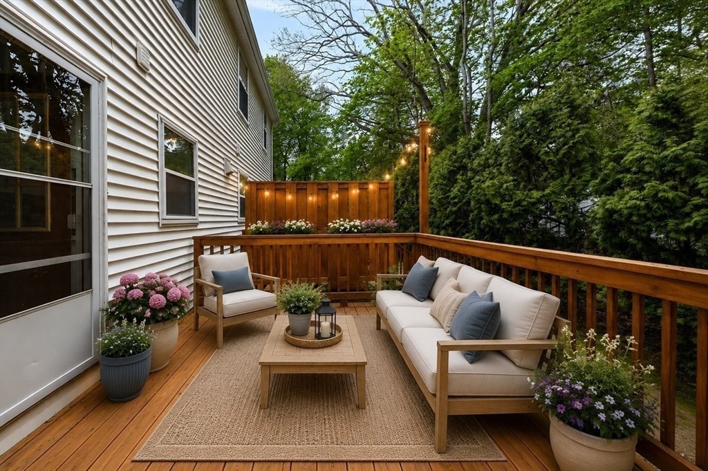 149 Bolivar Street, Unit B2 Canton, MA 02021 - Photo 28 of 34 a balcony with furniture and flowers