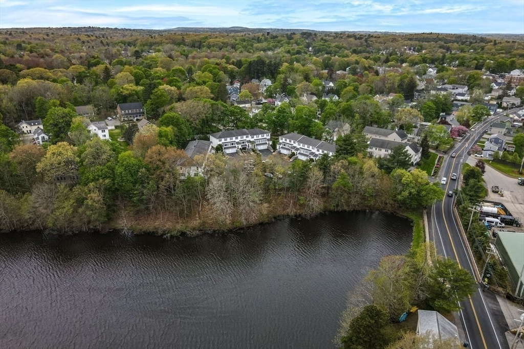 149 Bolivar Street, Unit B2 Canton, MA 02021 - Photo 34 of 34 an aerial view of residential houses with outdoor space and trees