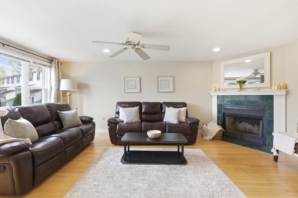 149 Bolivar Street, Unit B2 Canton, MA 02021 - Photo 4 of 34 a living room with furniture and a fireplace