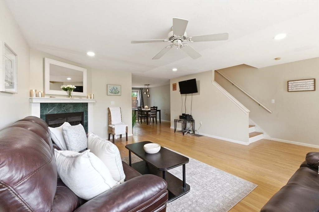 149 Bolivar Street, Unit B2 Canton, MA 02021 - Photo 5 of 34 a living room with furniture and kitchen view