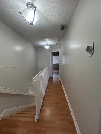 a bathroom with a sink toilet and mirror