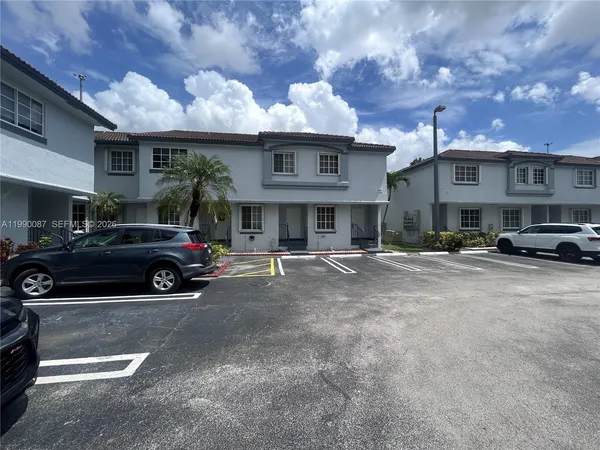 a car parked in front of a building