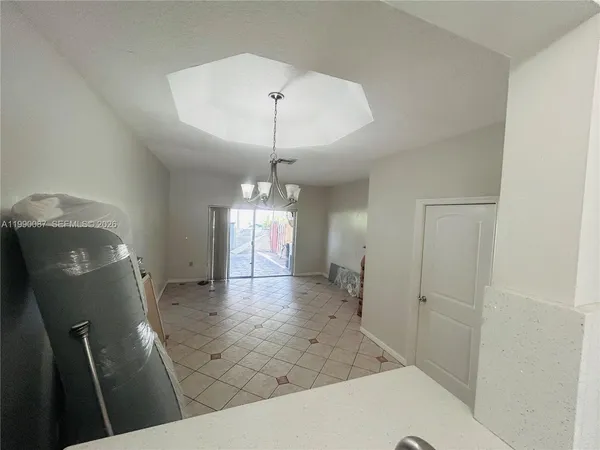 a utility room with cabinets