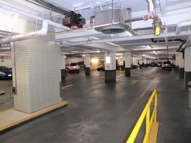 a view of a studio with wooden floor
