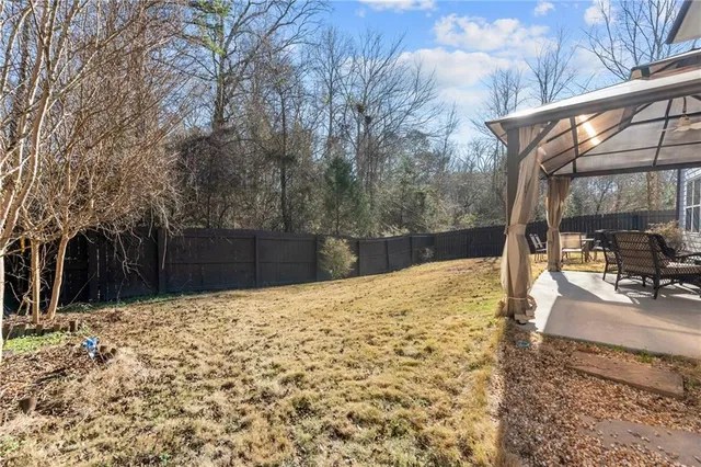 a front view of a house with a patio