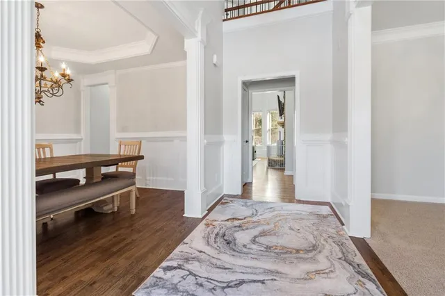 a room that has a bed and a chair in it